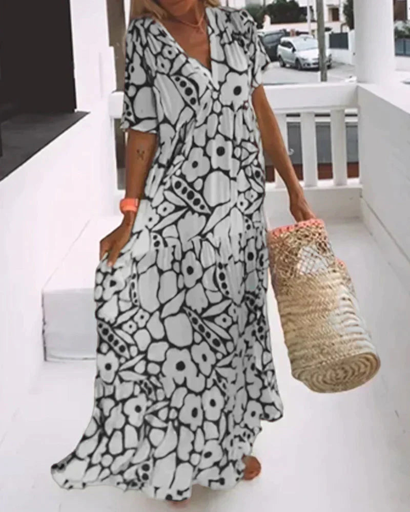 Christine | Flowy dress with elegant graphic prints